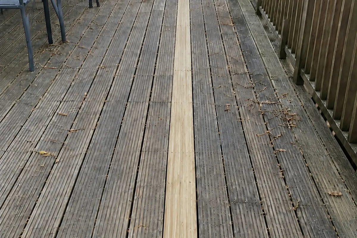 Wood deck with new replacement boards installed in St. Petersburg, FL