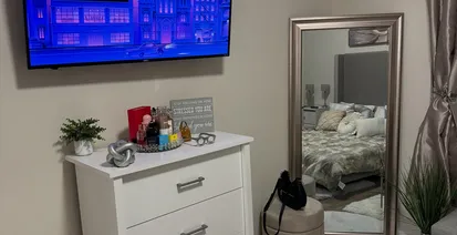 stud-mounted TV - Bedroom TV Mounting and Furniture Setup in St. Pete Beach